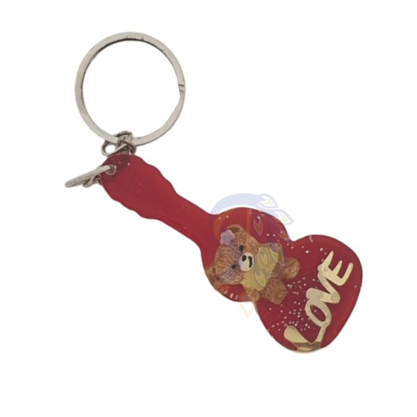 Guitar-Shaped Keychain With A Teddy Bear